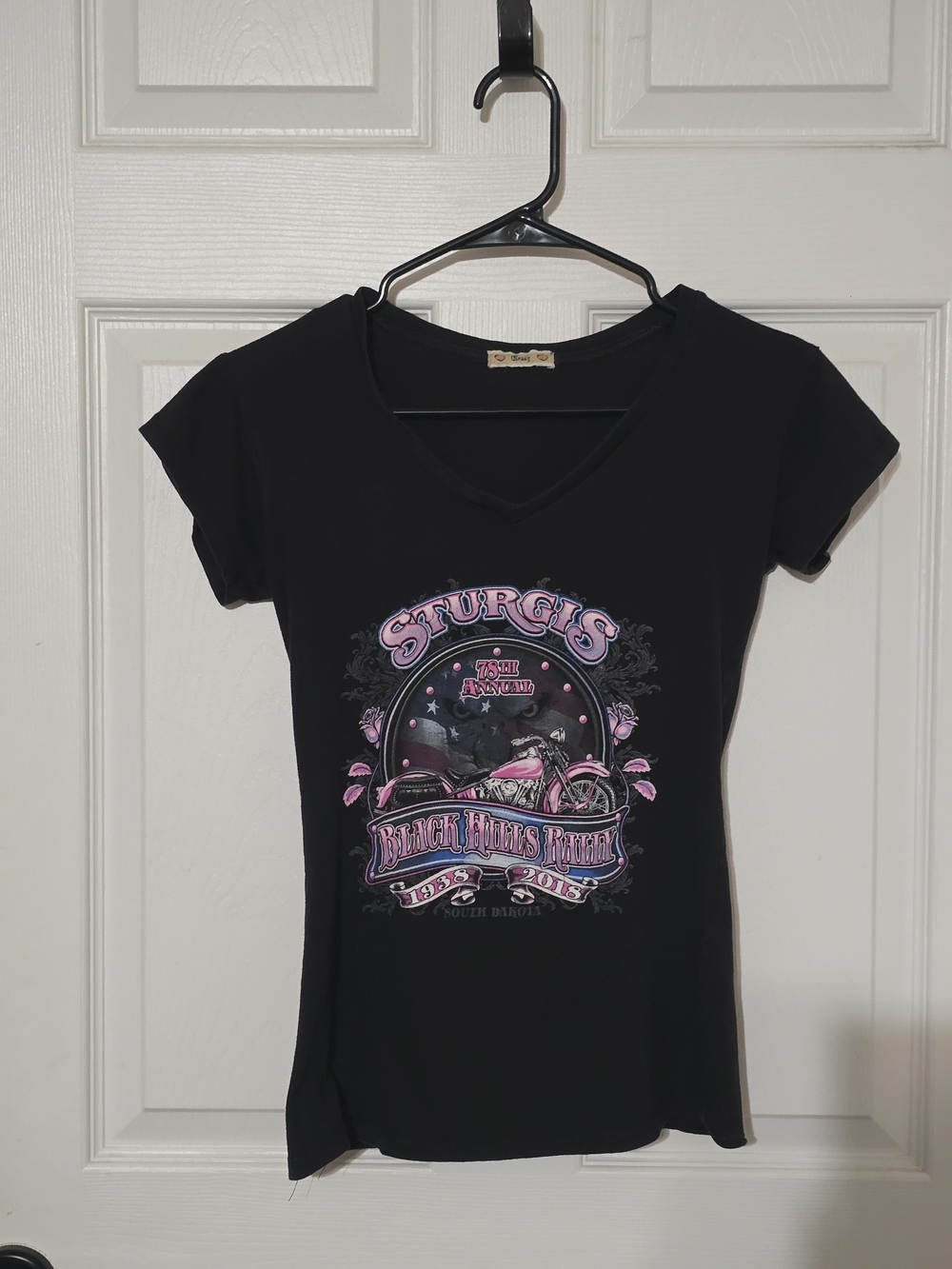 A Classy Chic Boutique Black V-Neck Tee with Pink Graphic